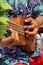 Asian, Japanese teenager playing the Ukulele on a beach in Chiba Japan