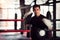 Asian kickboxing trainer in boxing gym