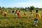 Asian kid playing football, physical education