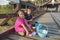 Asian kids with powder at Mon Bridge, Sangkhla Buri, Kanchanaburi Province, Thailand