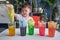 Asian kindergarten boy having fun making Rainbow Cabbage Experiment, Kid learn about how plants thrive by pulling water through