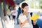 Asian lady student in university walking in walk way