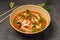 Asian laksa soup with noodles and seafood