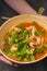 Asian laksa soup with noodles and seafood