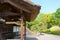 Asian landscape. Roof japanese style, element of ancient architecture. Blue sky, green tree, vintage roof