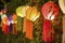 Asian lanterns on vine fence
