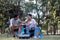 Asian LGBTQ couple drinking coffee in a romantic camping tent. LGBTQ couple drinking coffee in a camping tent, enjoying