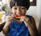 Asian little boy enjoy eating watermelon
