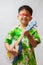 Asian little boy playing ukulele