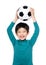 Asian little boy raise soccer ball up