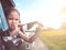 Asian little child girl having fun to play with paper airplane