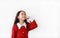 Asian little child girl in Scarlet red dress thinking expression and pointing index finger to head. Kid looking up for great idea