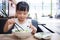 Asian little Chinese girl eating beef noodles soup