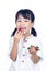 Asian Little Chinese Girl Eating Strawberry