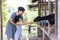 Asian Little Chinese Girl and mother feeding a goat with Carrot