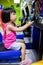 Asian Little Chinese Girl Playing Arcade Game Machine