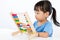 Asian Little Chinese Girl Playing Colorful Abacus