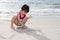 Asian Little Chinese Girl Playing Sand