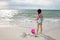 Asian Little Chinese Girl Playing Sand with Beach Toys