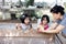 Asian Little Chinese Girls and mother playing wirh duck