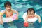 Asian Little Chinese Girls Playing in Swimming Pool