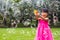 Asian Little Chinese Girls Shooting Bubbles from Bubble Blower