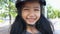 Asian little girl Smile with happiness wearing sport safety helmet