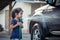 asian little girls helping parent washing a car