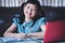 Asian little schoolgirl studying during her online lesson at home with smile and happy, social distance during quarantine,online