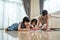 Asian Little siblings girl draw and color picture with mother on floor. Beautiful loving parent, mom spend time with small cute