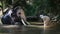 Asian mahout with elephant in creek ,Chiang mai Thailand.