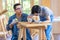 Asian male carpenter woodworker engineer dad in jeans outfit with safety gloves and glasses goggles helping teaching son using