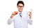 Asian male doctor with apple and stethoscope