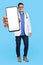 Asian male doctor looking to camera, smiling and showing empty blank white copy space phone mock up template
