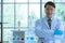 Asian male scientist stand and smile in lab room