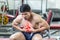 Asian man chest pain after workout in gym