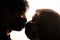 Asian man and European girl kiss through medical masks. Virus. Coronavirus china