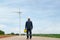 Asian man Inspection engineers preparing and progress check of a wind turbine with safety in wind farm in Thailand