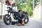 Asian man motorbike in black leather jacket travel rider trip. Handsome Men wear sunglass outdoor lifestyle freedom rider. Men