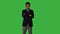 Asian Man Standing isolated on green screen background