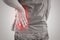 Asian man suffering from muscle waist pain injury, People with b