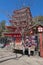 An Asian man takes photo with the rooftop of Chureito pagoda