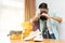 Asian man taking photo to shoes with digital camera for post to selling online on the internet