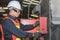 Asian man technicians Checking the electrical system Of the machine in the industrial factory