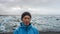 Asian man travel to Iceland at Glacier lagoon