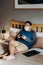 Asian man weared medical mask. Sitting and Playing video games in bedroom