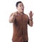 Asian Man Wearing Batik Shirt Smiling and Pointing Forward
