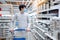 Asian man wearing face mask shopping kitchenware