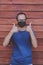 Asian man wearing face protection mask raising good thumb sign