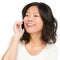 Asian mature woman talking on mobile phone